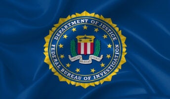 FBI insignia on a blue cloth background