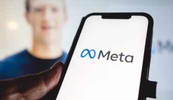 Meta phone screen and Mark Zuckerberg