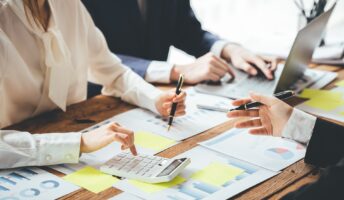 Small business signing loan paperwork