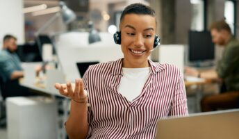 Employee using a VoIP phone in the office