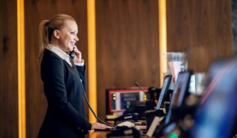 Hotel worker using a front of house system