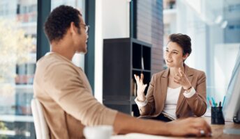 Female employee asking employee for a raise