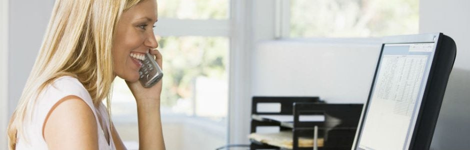 Woman using a cordless phone
