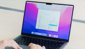 Image of a person using the Surfshark VPN on an laptop computer