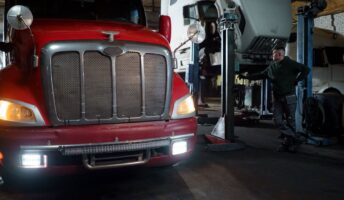 Fleet trucks in a garage