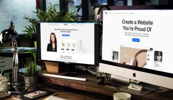wix vs weebly depicted on two computer screens